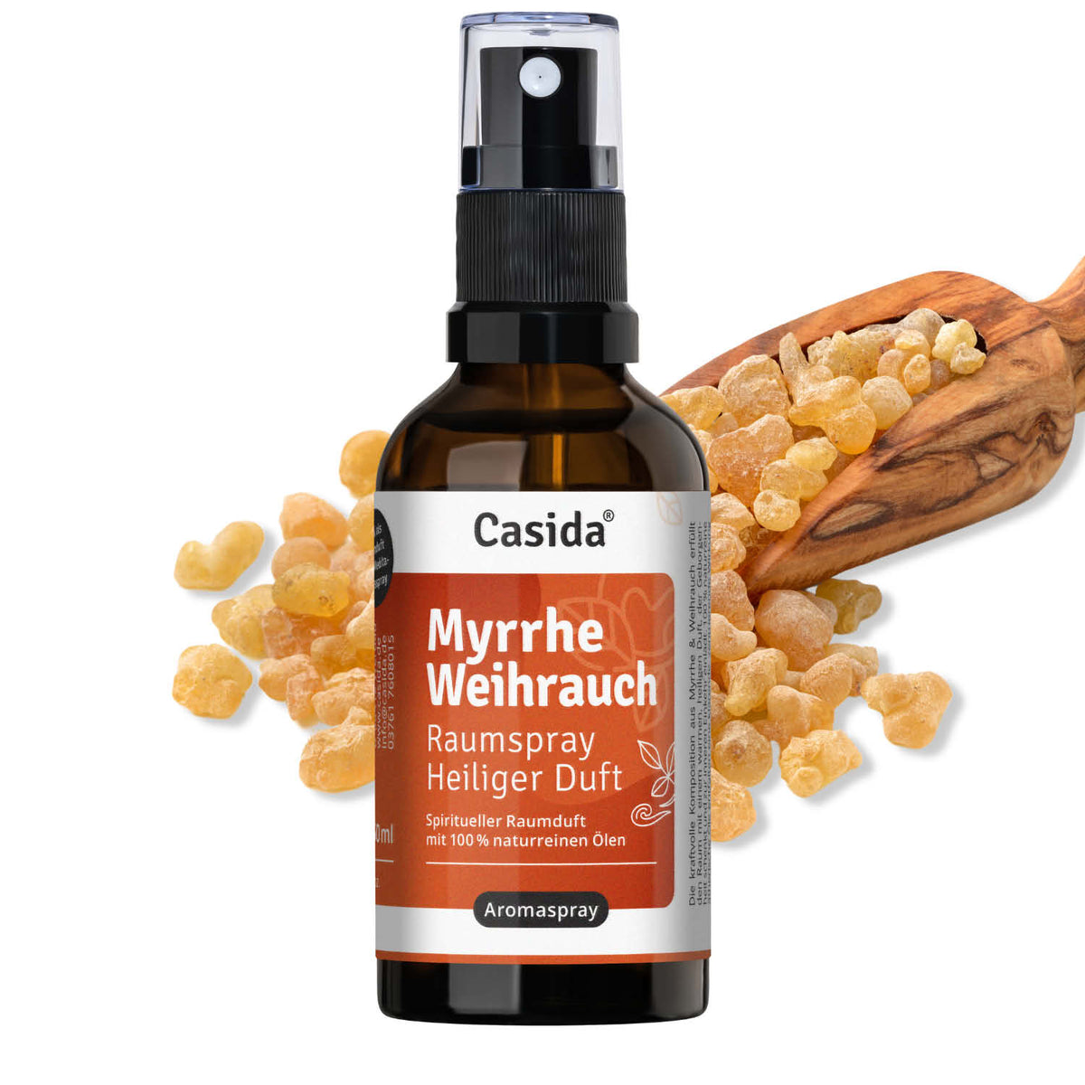 Myrrhe Weihrauch raumspray bottle with a spray nozzle, surrounded by myrrh resin pieces and a wooden scoop.