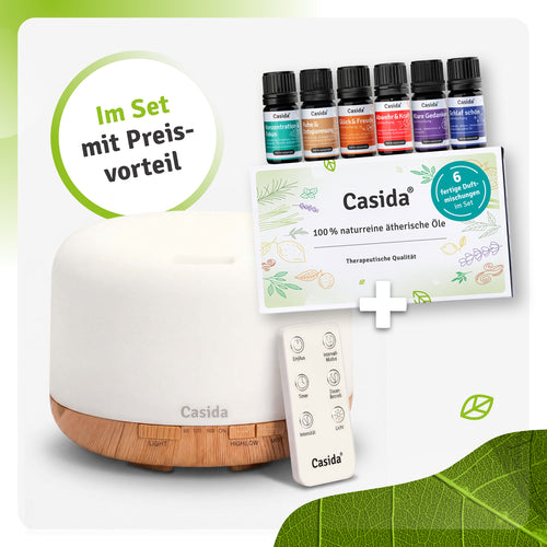Aroma diffuser with remote control, 500 ml capacity, and six essential oil blends in a set.
