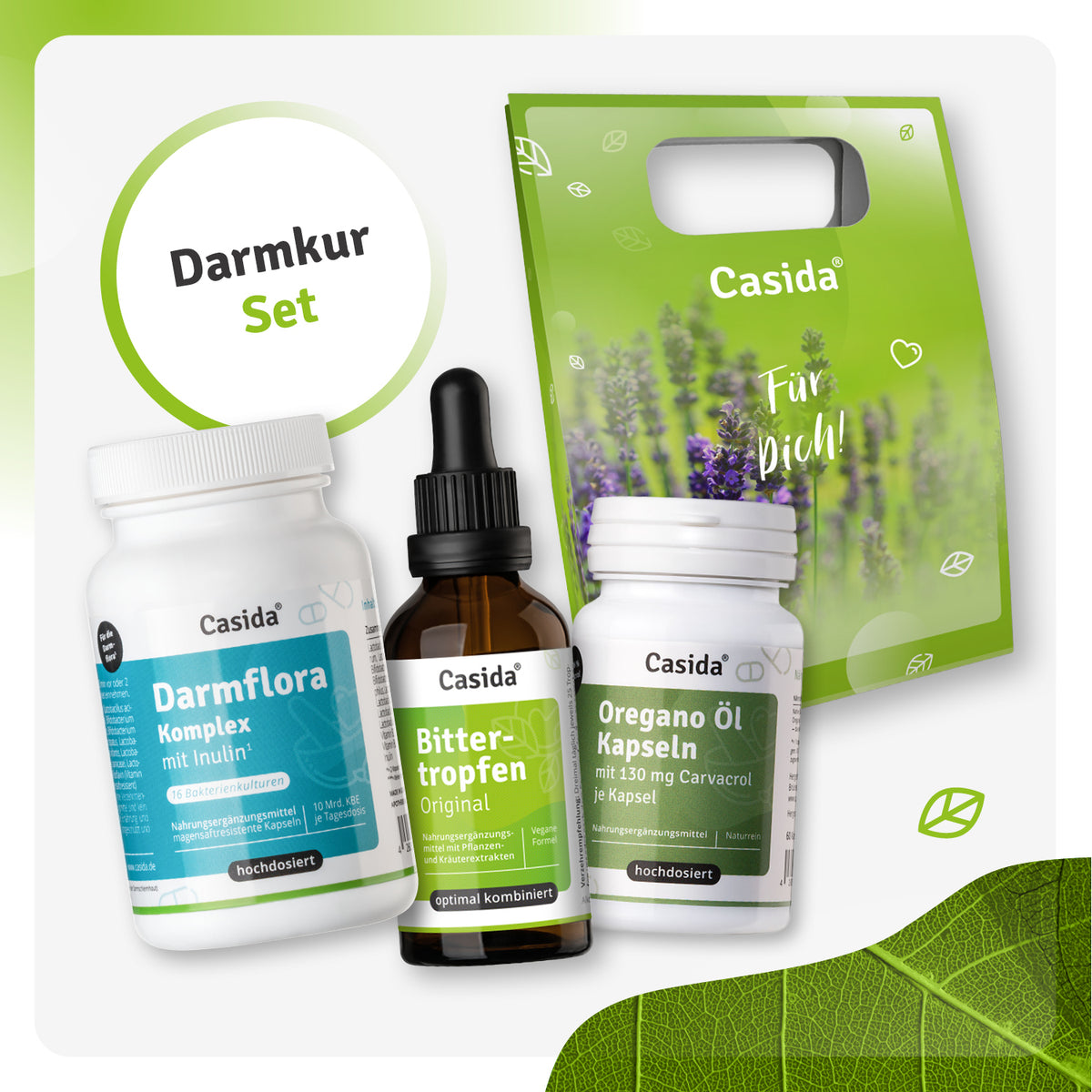 Casida Darmkur set featuring three products: Darmflora complex, Bitter drops, and Oregano oil capsules in a green box.