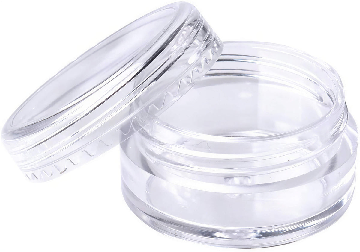 Clear 5 ml mini cream jar with a screw cap, showcasing a transparent design and smooth edges.