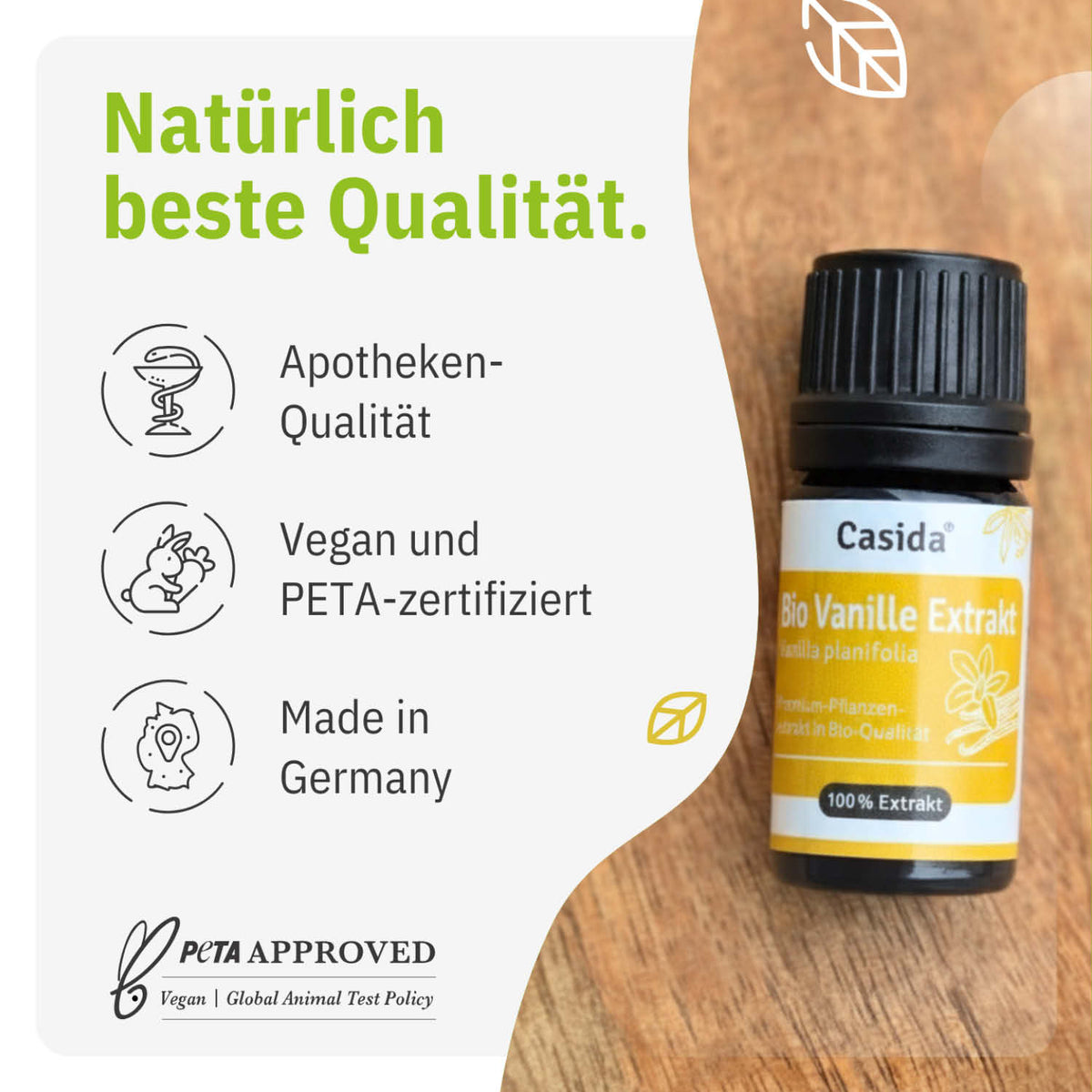 Bio Vanille Extrakt in a small black bottle, featuring a yellow label with text about quality and vegan certification.