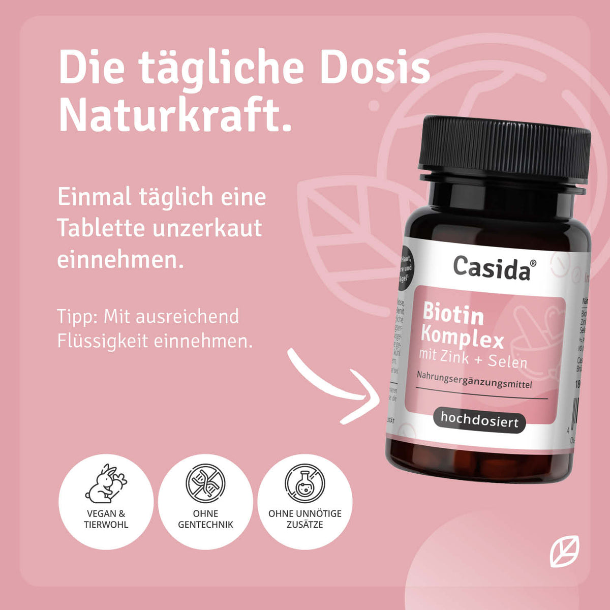 Casida Biotin Komplex dietary supplement bottle with a black cap, featuring a pink label and dosage instructions.