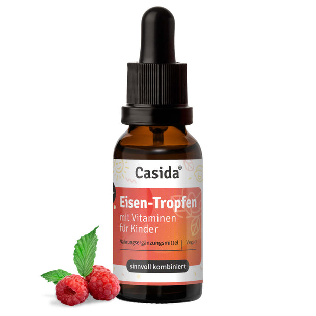 Eisen Tropfen mit Vitaminen für Kinder in einer braunen Tropfflasche, mit Himbeeren und einem veganen Label.