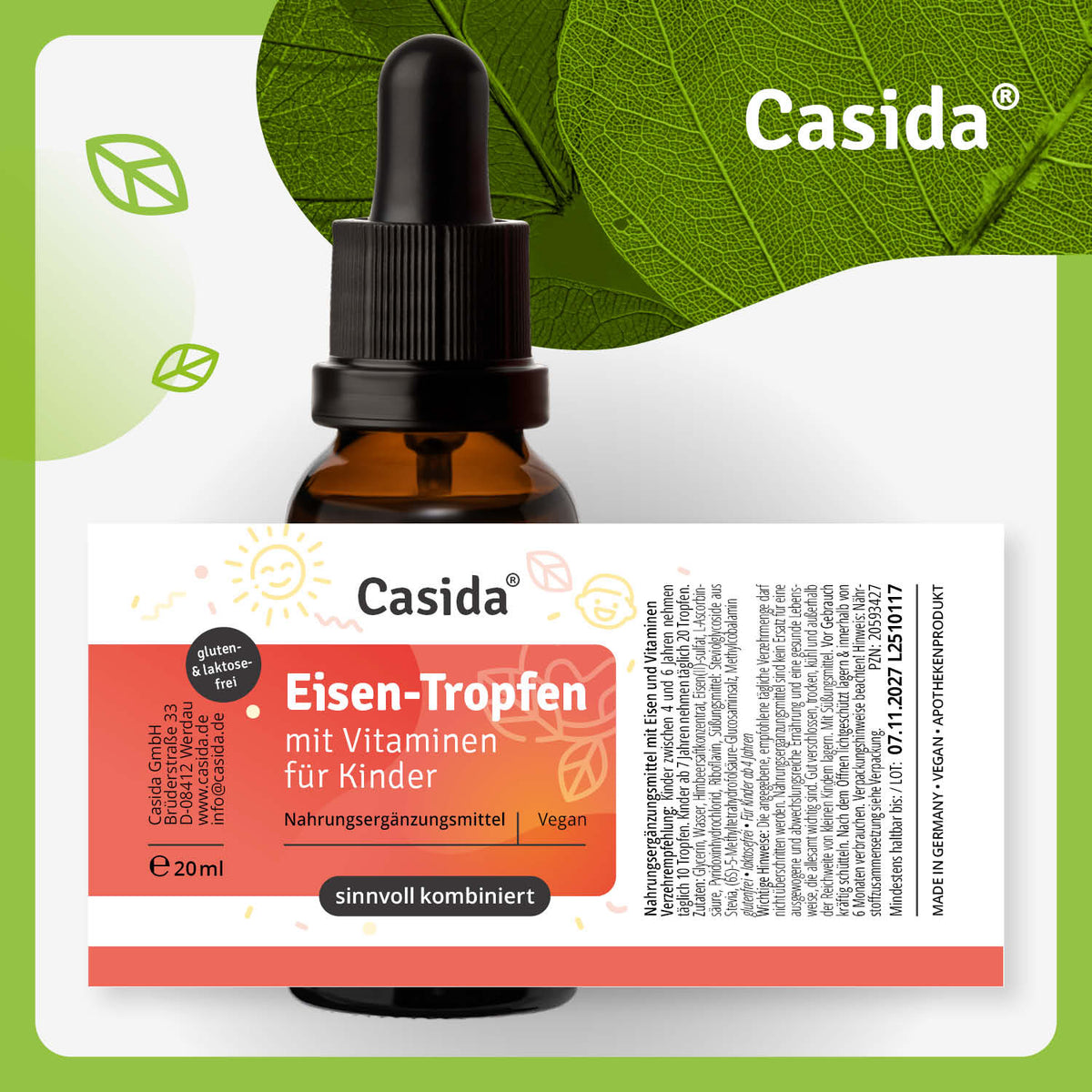 Eisen Tropfen mit Vitaminen für Kinder in a brown glass dropper bottle, labeled with product details and a green background.