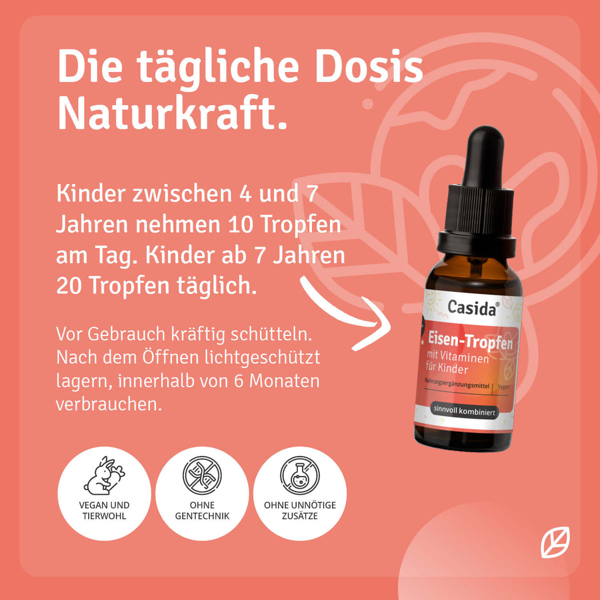 Eisen Tropfen mit Vitaminen für Kinder in einer braunen Glasflasche mit Pipette, auf rotem Hintergrund.