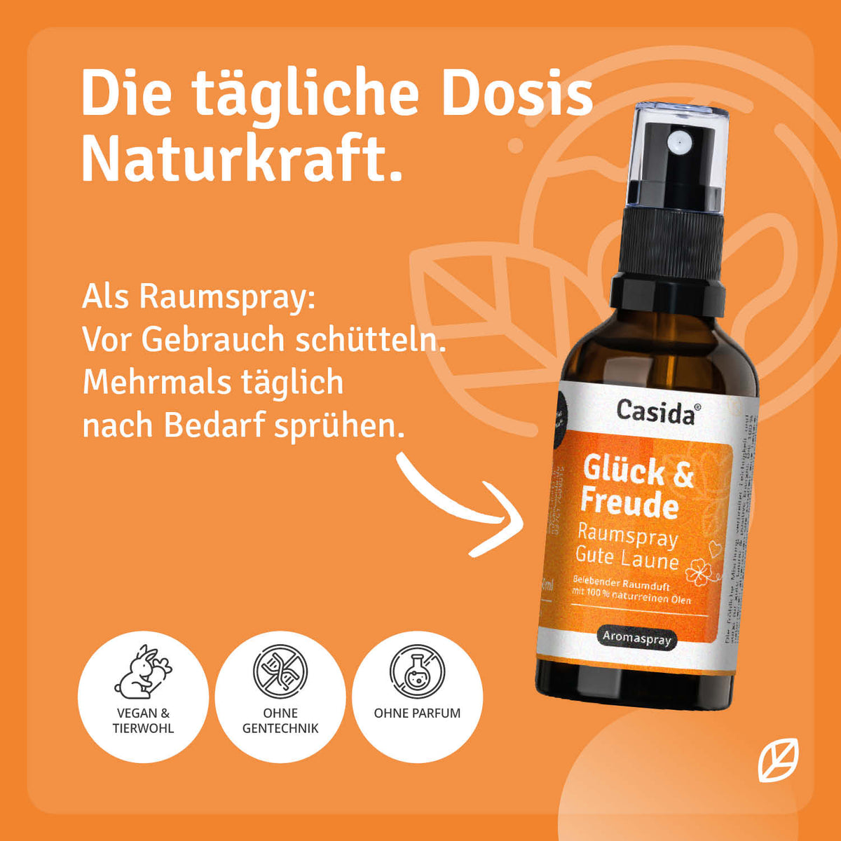 Glück & Freude raumspray in a brown bottle with a black spray nozzle, featuring orange and white label design.