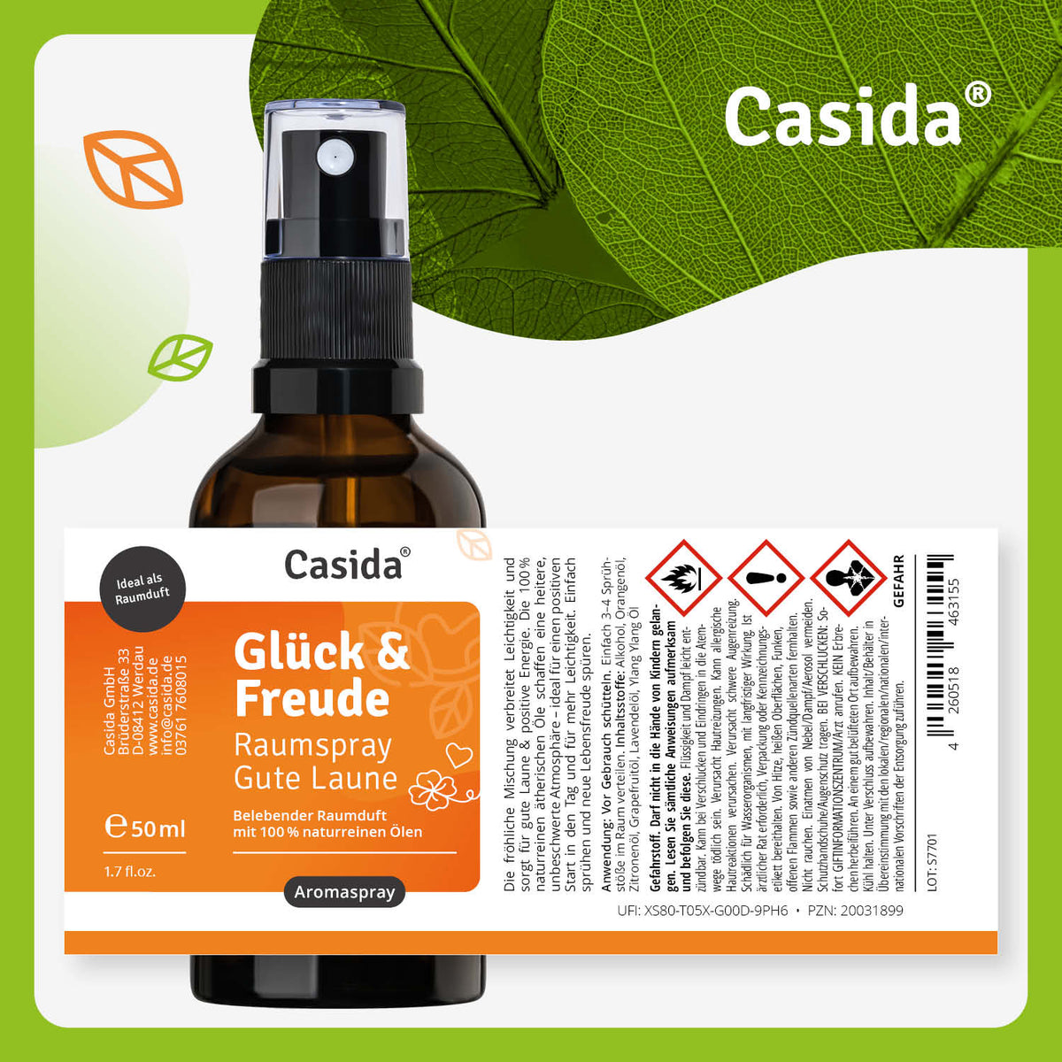 Glück & Freude raumspray in a brown glass bottle with a black spray nozzle, 50 ml, labeled with product details.