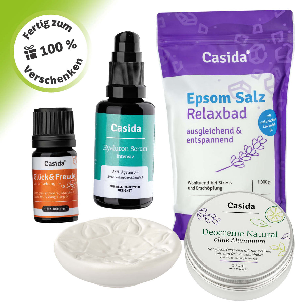 Casida Geschenkbox: Fühl Dich Wohl-Box with Epsom salt, hyaluronic serum, essential oil, and natural cream in a white box.